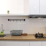 Modern Chic Studio Room At Grand Asia Afrika Apartment By Travelio