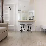 Modern Chic Studio Room At Grand Asia Afrika Apartment By Travelio