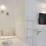 Modern Chic Studio Room At Grand Asia Afrika Apartment By Travelio