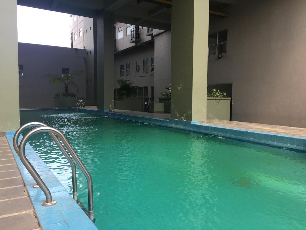 Modern Chic At Grand Afrika By Travelio Apartemen