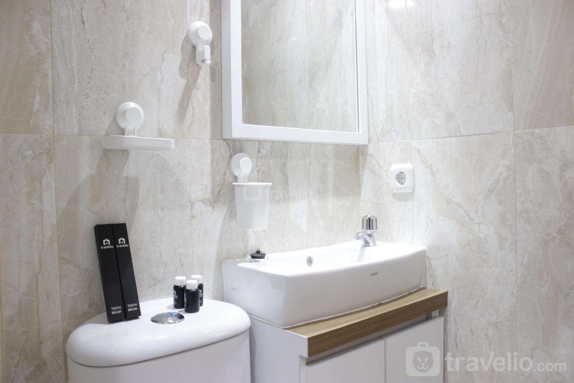Apartemen Modern Chic At Grand Afrika By Travelio